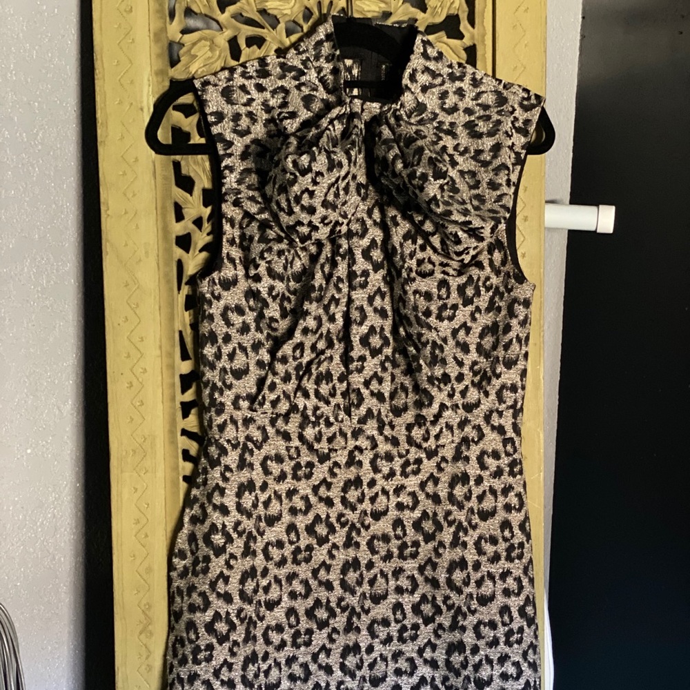Women’s cheetah print cocktail dress.